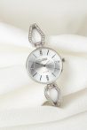Silver Renk Metal Taşlı Kordonlu Yeni Sezon Beyaz Renk İç Tasarımlı Bayan Clariss Marka Kol Saati
